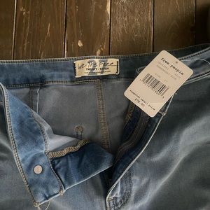 Free People size 27 flared light wash jeans. New with tags.